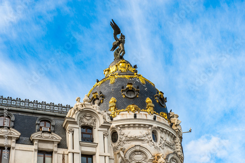 It's Metropolis building, Madrid, Spain. It was designed by Jules and Raymond Fevrier for the insurance company La Union y el Fenix photo