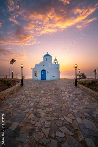 Cyprus. Protaras. Church of St. Nicholas in Cyprus. The Port Of Paralimni. Pernera. Blue and white Church on the coast of the Mediterranean sea. Attractions Of Cyprus.  photo