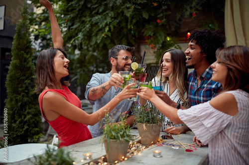 Photography Group of young people make a toast