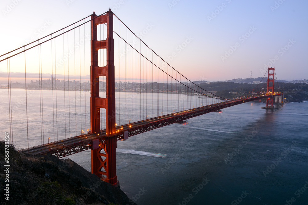 San Francisco California USA - August 17, 2019: Golden Bridge viewed from Battery Spencer at sunrise