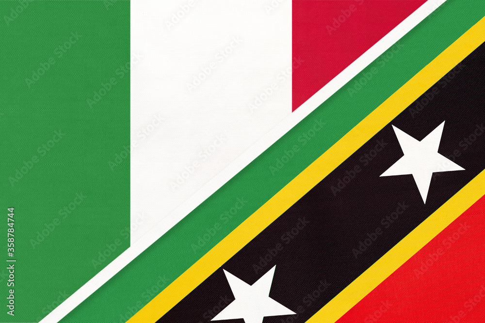 Italy and Saint Kitts and Nevis, symbol of two national flags from textile. Championship between two countries. Italy and Saint Kitts and Nevis, symbol of two national flags from textile. Championship between two countries.