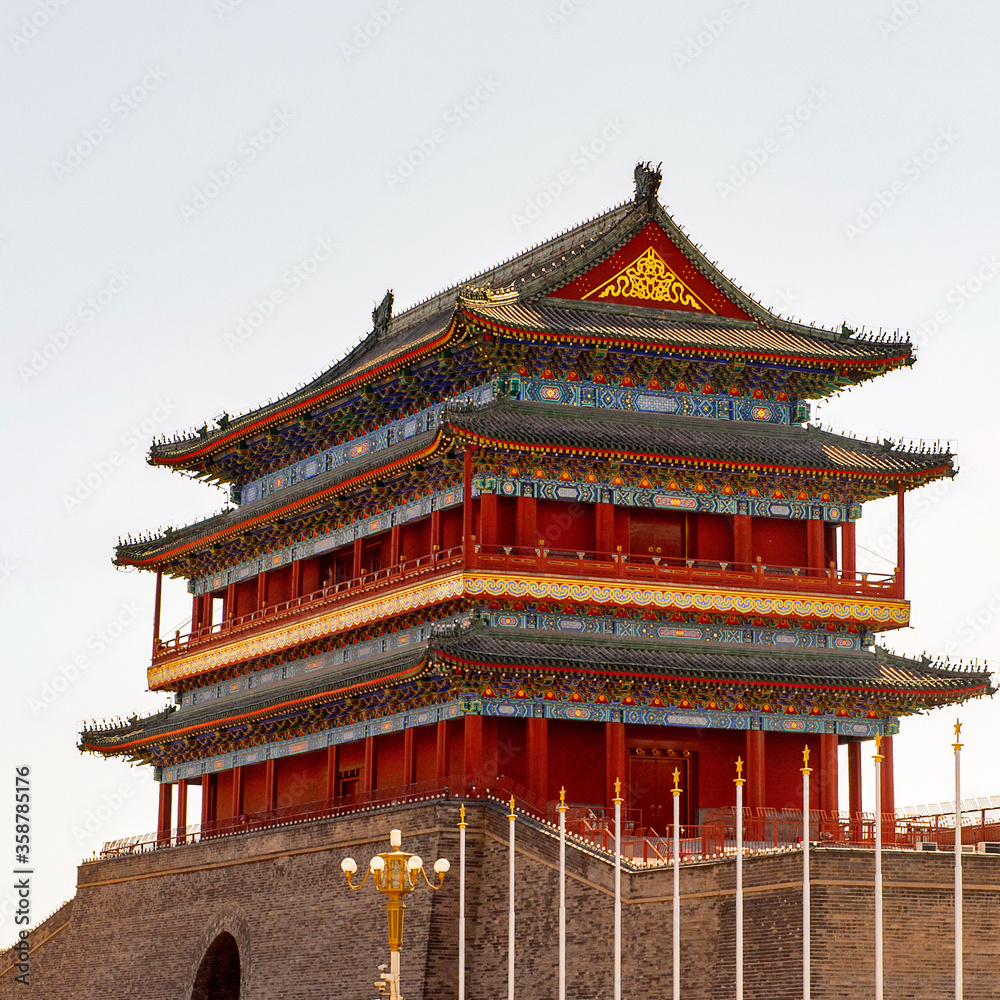 It's Zhengyangmen Gatehouse at the Tiananmen Square (Gate of Heavenly Peace), a large city square in the centre of Beijing, China It's Zhengyangmen Gatehouse at the Tiananmen Square (Gate of Heavenly Peace), a large city square in the centre of Beijing, China
