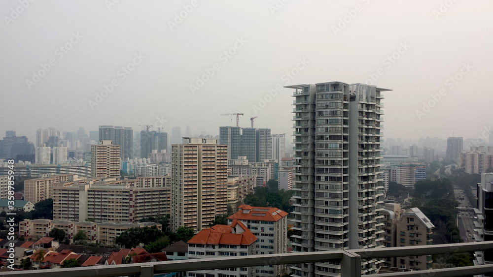 aerial view of big modern building and old vintage apartment blue sky of singapore city aerial view of big modern building and old vintage apartment blue sky of singapore city