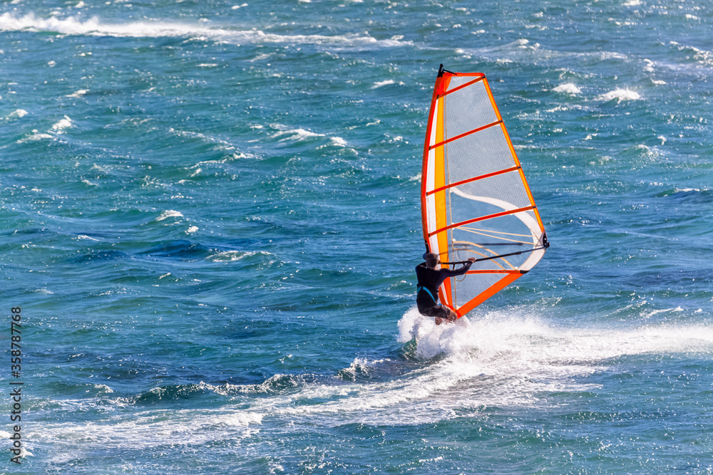 windsurfer on the sea windsurfer on the sea