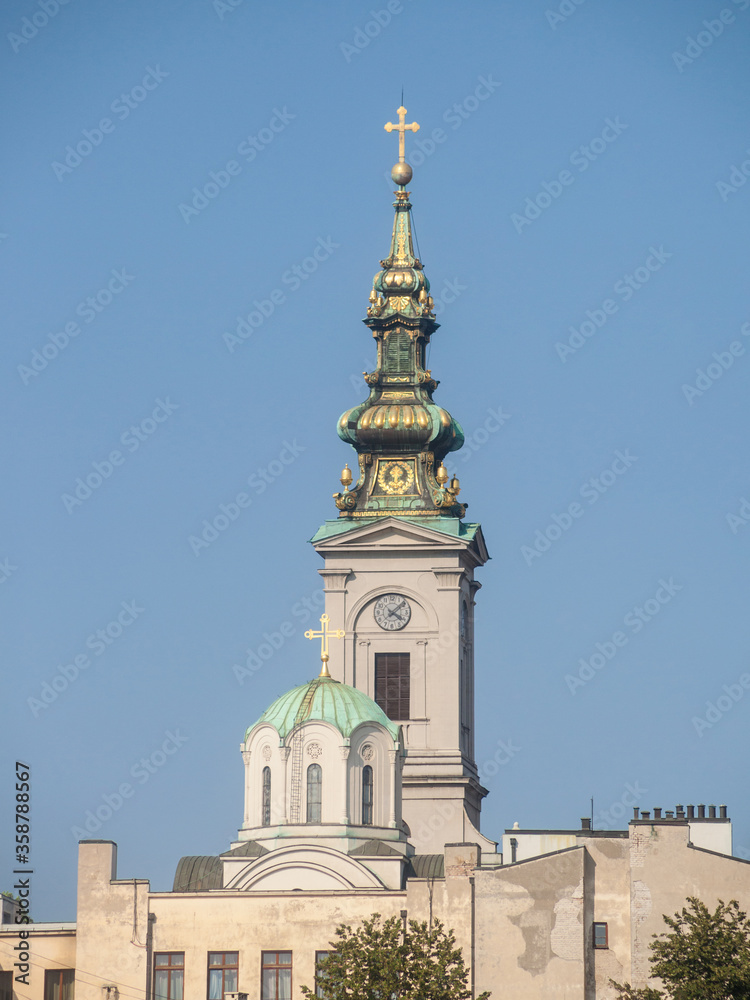 Obraz premium Saint Michael Cathedral, also known as Saborna Crkva, with its iconic clocktower seen from a street of Stari Grad district. It is one of the main landmarks of Belgrade, Serbia.