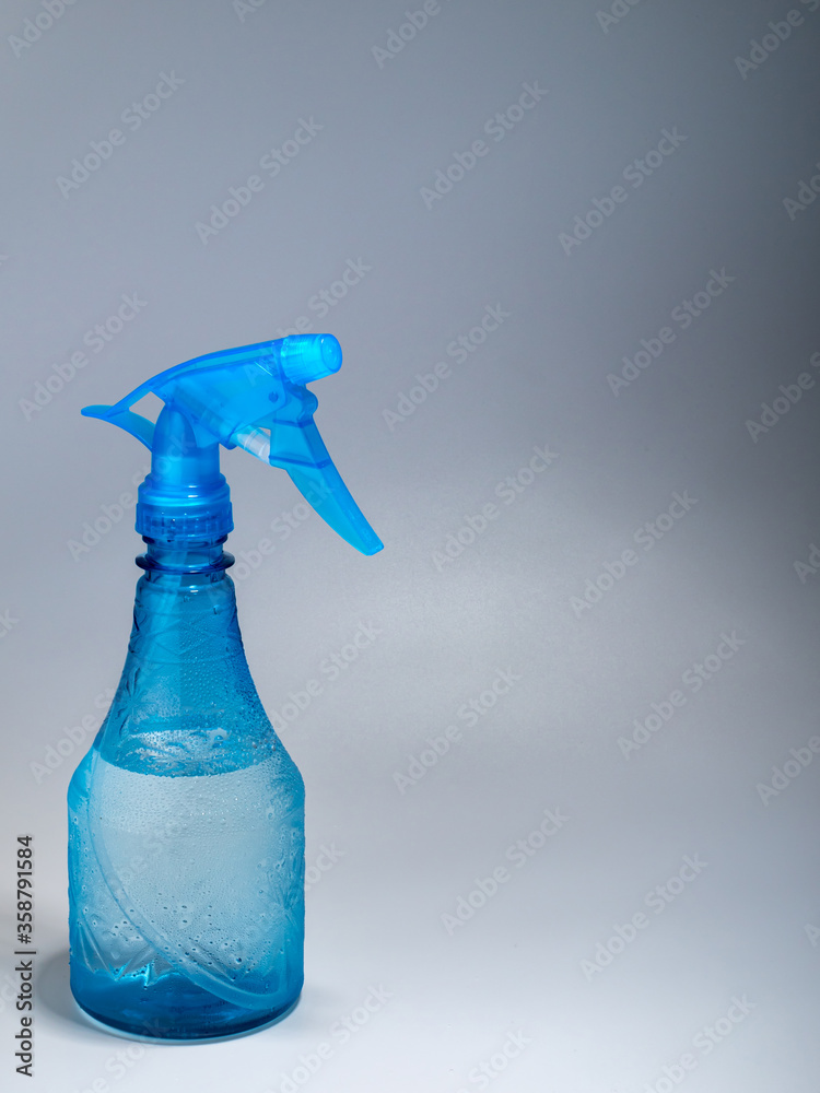 blue plastic water bottle with spray gun blue plastic water bottle with spray gun