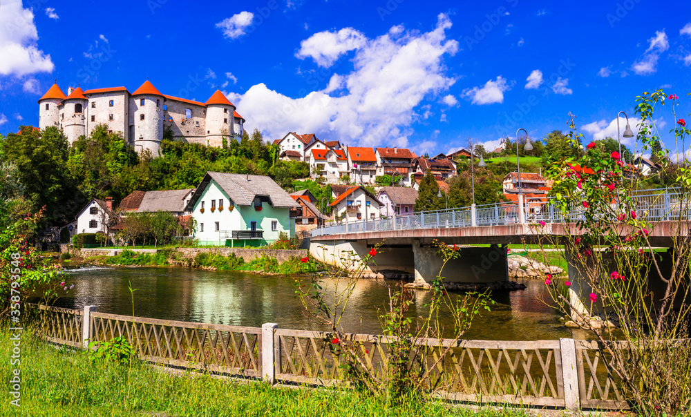 Slovenia landmarks and travel - medieval castle and village Zuzemberk over Krka river
