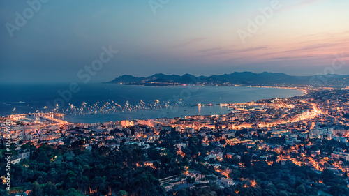 The city of Cannes in the evening photo