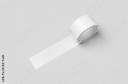White unrolled duct tape mockup on a grey background. photo