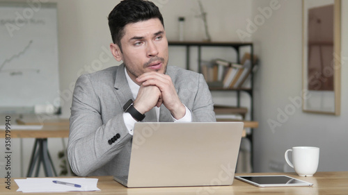 Fotografie Anxious Businessman Waiting in Office