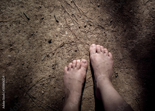 barefoot on the sand - walking bare foot in the nature - connection to the earth - simplicity human - the strength of being humble