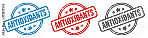 antioxidants stamp. antioxidants round isolated sign. antioxidants label set