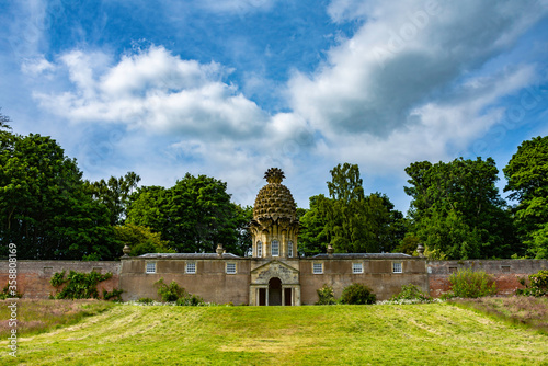 Fotografija The Pineapple building and garden folly in scotland.