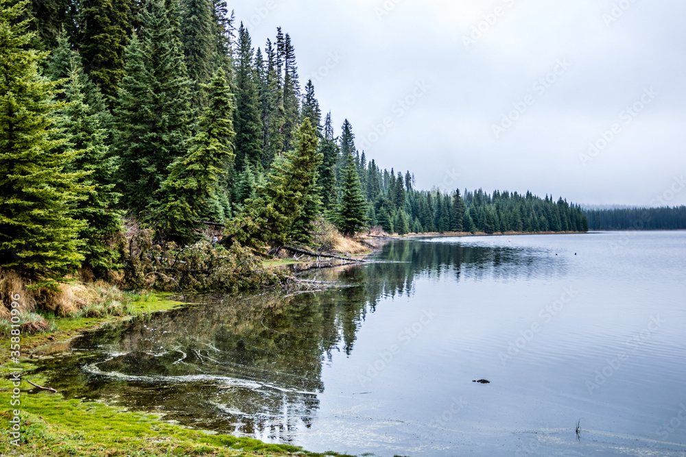 Last days of winter hover over the lake. Swan Lake Provincial Recreation Area, Alberta, Canada