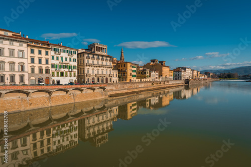FLORENCE  TUSCANY   ITALY - DECEMBER 27 2019  Buildings reflecion in Arno river water in Florence