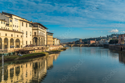 FLORENCE, TUSCANY / ITALY - DECEMBER 27 2019: Arno river photo in Florence city