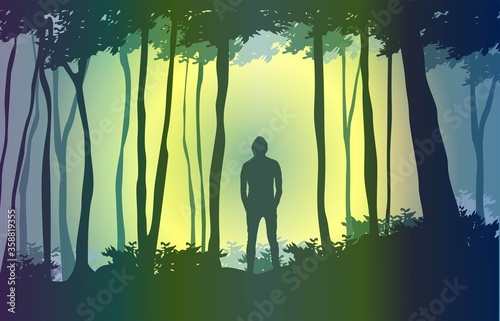 silhouette di uomo in un bosco