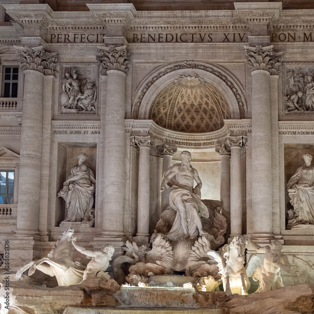 Rome Italy, a partial night view of the famous trevi fountain with impessive illumination Rome Italy, a partial night view of the famous trevi fountain with impessive illumination