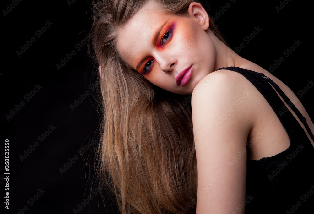 Young beautiful stylish girl posing in studio. Young beautiful stylish girl posing in studio.