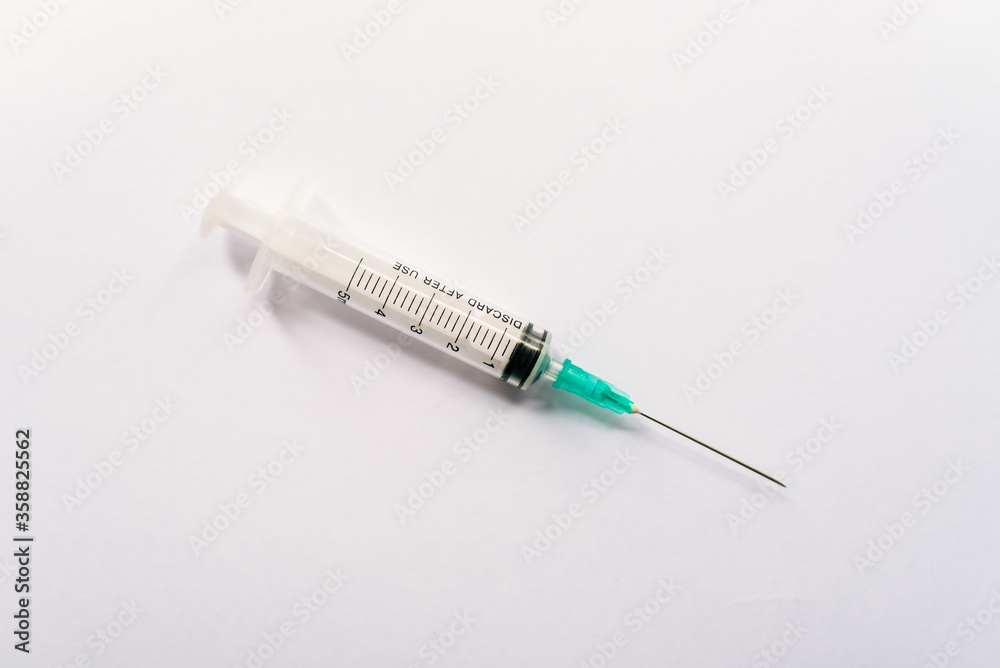 Syringe on a white background. Syringe on a white background.