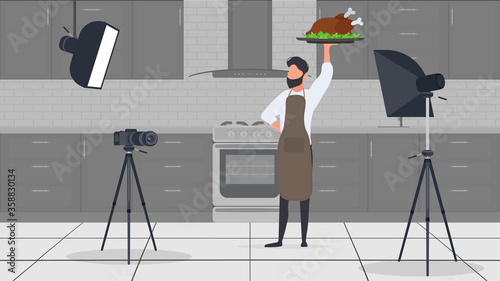 A male cook in the kitchen has a culinary blog. The guy in the kitchen apron is holding fried chicken. Vector.