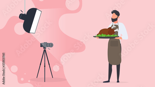 Culinary blogger. A man in a kitchen apron holds a fried chicken on a tray. Camera on a tripod, softbox. Culinary blog or vlog concept. Vector.