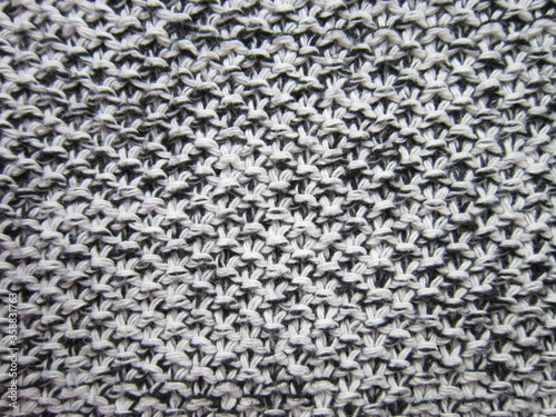 Knitting texture, knitted background, black and white threads.