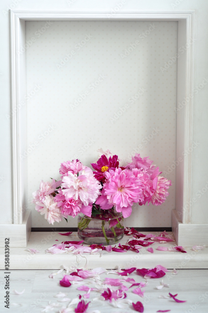 Beautiful pink peonies are very cozy Beautiful pink peonies are very cozy