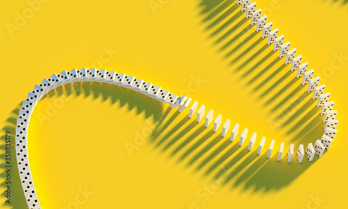 game of domino on yellow background.