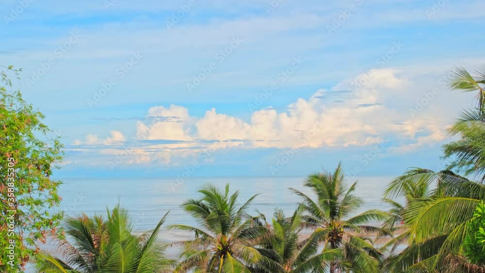 4k Beautiful amazing Time lapse of sky and clouds over Hua Hin beach and coconut trees at Prachuap Khiri Khan, Thailand. 4k Beautiful amazing Time lapse of sky and clouds over Hua Hin beach and coconut trees at Prachuap Khiri Khan, Thailand.