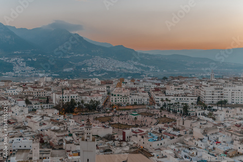 Tetouan in Northern Morocco with Rif Mountains in the background  © Mbkphotographer