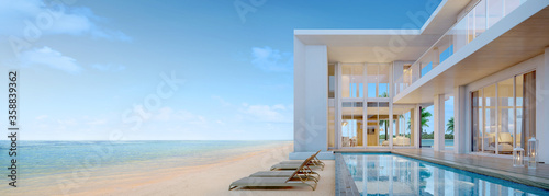 Sea view.Luxury modern beach house with swimming pool and sunbed  for vacation home or hotel.3d rendering photo