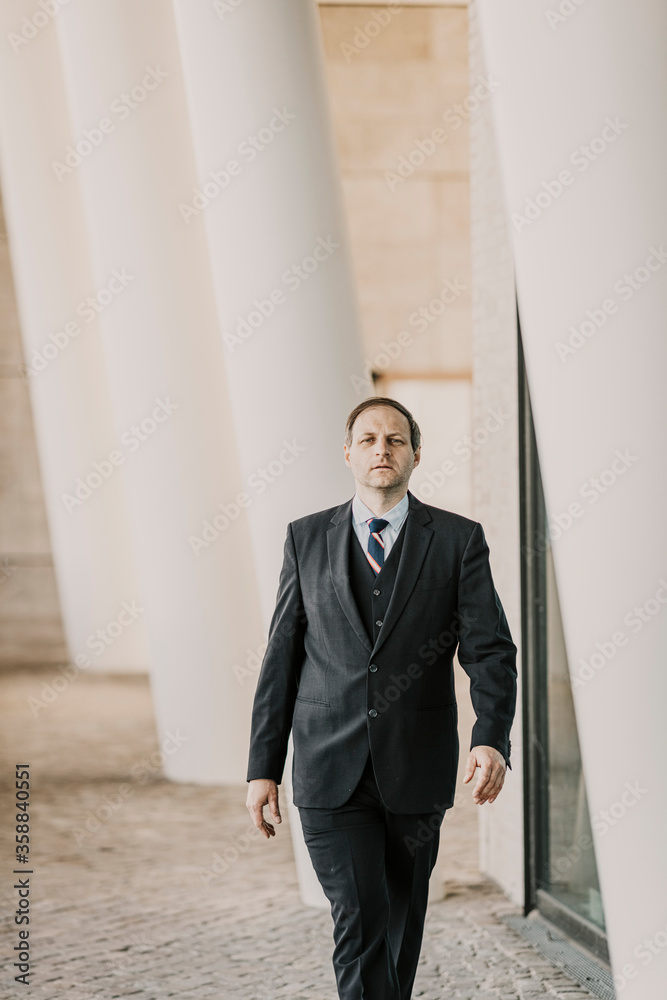 Europe, Germany, Hamburg, Hafencity, Businessman in public Europe, Germany, Hamburg, Hafencity, Businessman in public