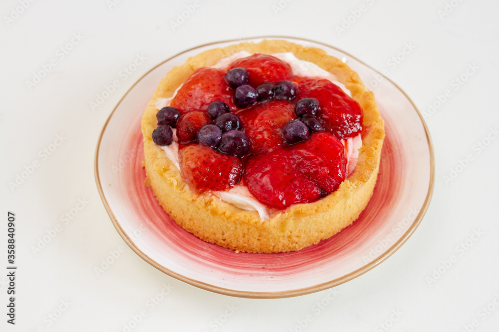 Strawberry tart cake on white background. Selective focus Strawberry tart cake on white background. Selective focus