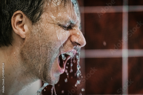 Europe, Germany, Hamburg, Hafencity, male under shower
