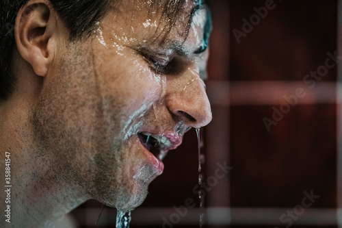 Europe, Germany, Hamburg, Guy taking a shower