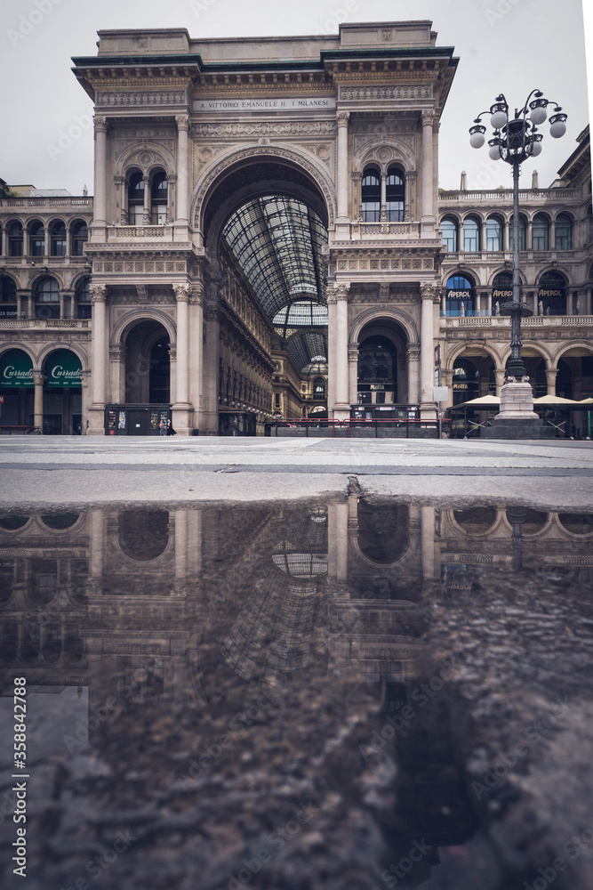 Milan, Italy city centre with no people during covid 19 epidemic in a rainy day Milan, Italy city centre with no people during covid 19 epidemic in a rainy day