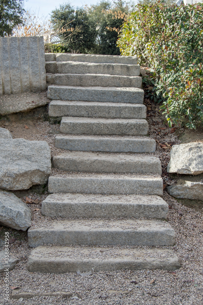 solated granite stone steps in a public park in Madrid. Spain solated granite stone steps in a public park in Madrid. Spain