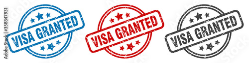 visa granted stamp. visa granted round isolated sign. visa granted label set photo