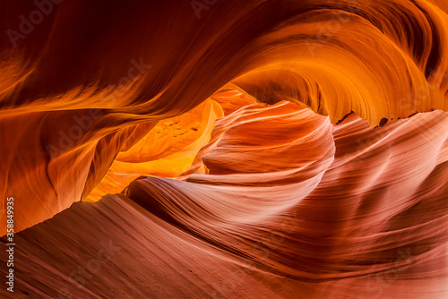 A spiral of rock striations stretches skyward in lower Antelope Canyon, Page, Arizona