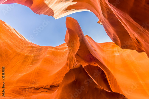 A view from the bottom of the slot canyon looking skyward in lower Antelope Canyon, Page, Arizona