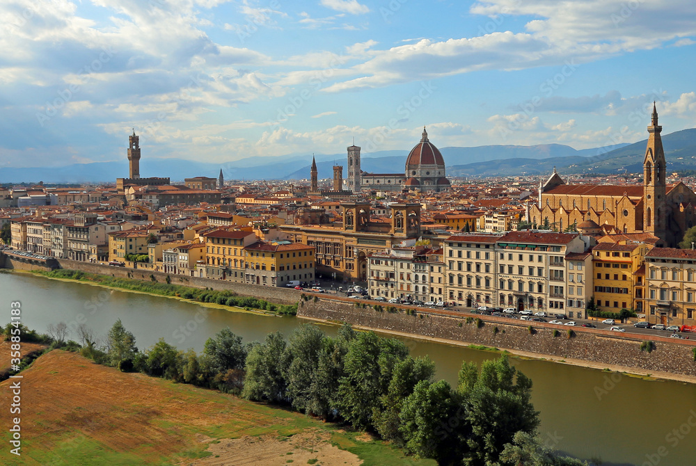 city of Florence with the historic buildings and the Arno river