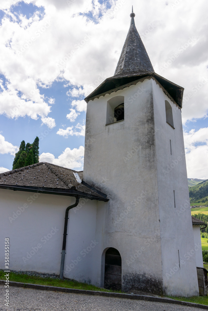 view of the historic town church in the Swiss Alps village of Zillis-Reischen