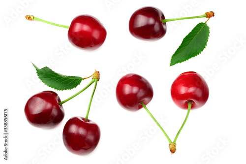cherry with green leaf isolated on white background. Top view