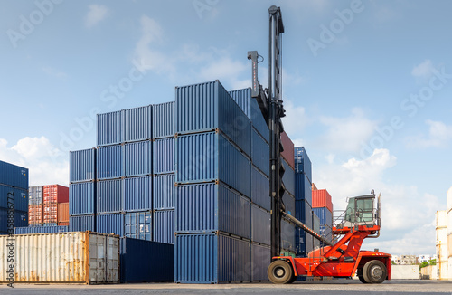 Folk lift car working in container yard for preparing imported or exported products background