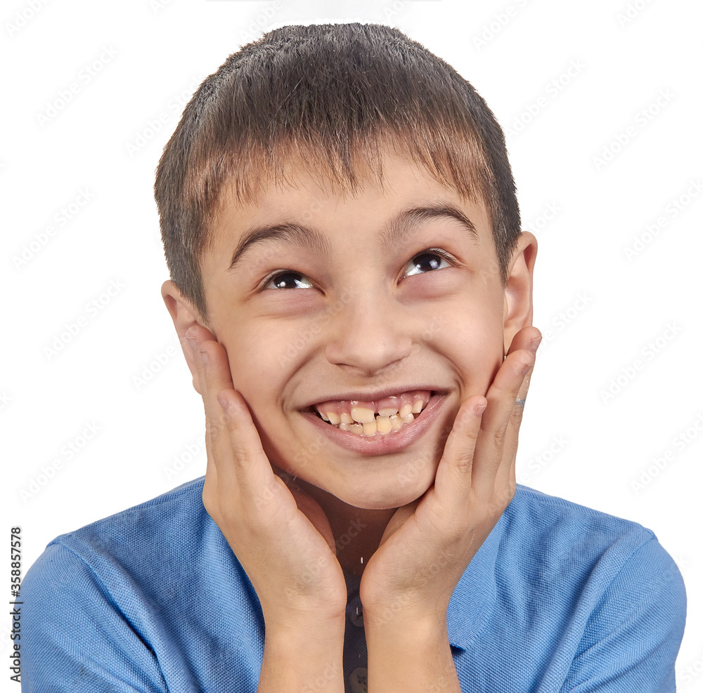 surprised child a boy in a blue t shirt isolate surprised child a boy in a blue t shirt isolate