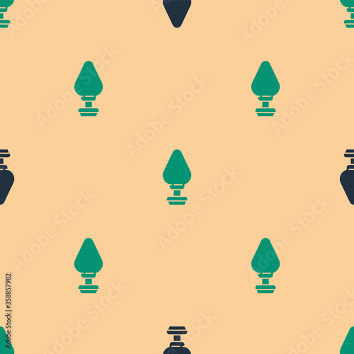Green and black Anal plug icon isolated seamless pattern on beige background. Butt plug sign. Fetish accessory. Sex toy for men and woman.  Vector Illustration