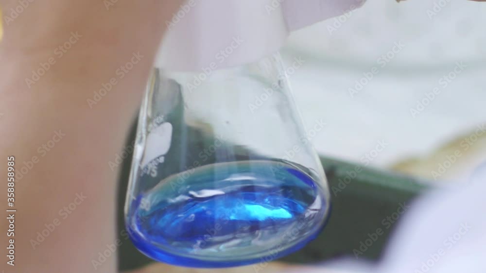 Erlenmeyer flask in laboratory, processing of the laboratory sample in