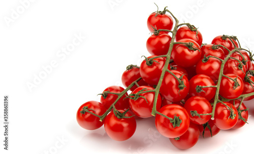 ripe cherry tomatoes on a vine, three bunches on a white isolated background, space for text,