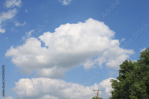 sky, clouds, cloud, blue, nature, white, weather, day, cloudscape, cloudy, summer, air, space, sun, fluffy, heaven, light, blue sky, atmosphere, skies, landscape, sunny, bright, outdoors, natural